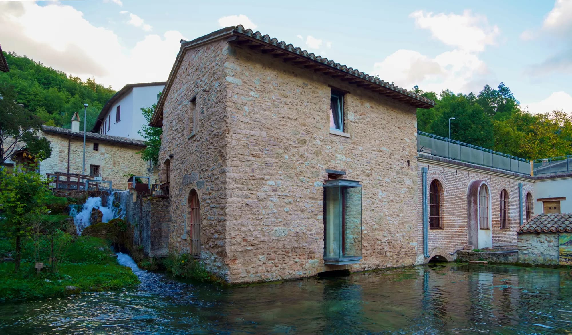 An old stone mill overlooking the water in Rasiglia
